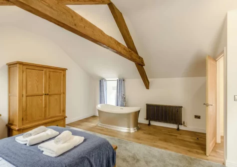 The bedroom at Nyth Y Wennol, Maenan