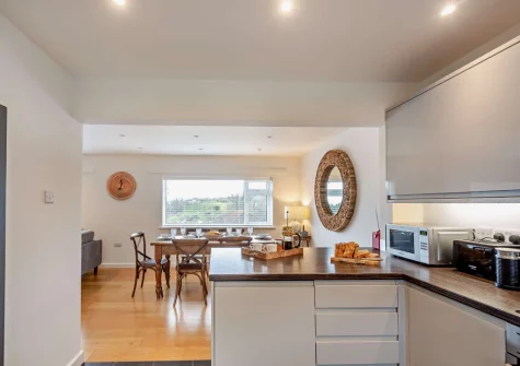 The kitchen & dining area at Nyth yr Wylan, Aberdovey