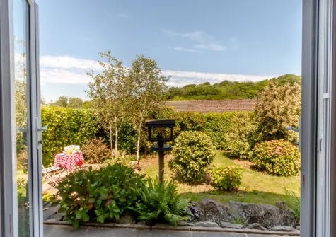 Step out into the lawned garden at Oak View, Tenby