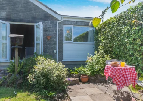 The patio, outdoor sitting area & garden at Oak View, Tenby