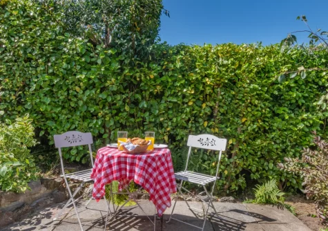 The patio, outdoor sitting area & garden at Oak View, Tenby