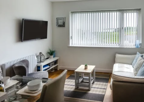 Ocean Breeze, Penally is a stylish two-bedroom apartment on the edge of this charming coastal village, featuring contemporary interiors, a shared lawned garden, and easy access to Tenby's golden beaches and the legendary Pembrokeshire Coast Path.