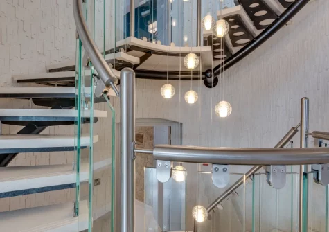 The large circular staircase connects all seven floors at Ocean House, Tenby