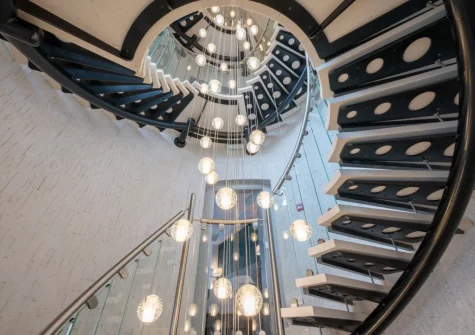 The large circular staircase connects all seven floors at Ocean House, Tenby