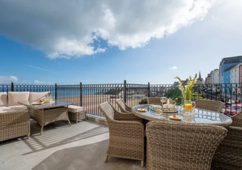 The beautiful large tiled balcony & alfresco dining area at Ocean House, Tenby
