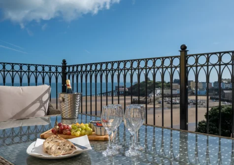 The beautiful large tiled balcony & outdoor sitting area at Ocean House, Tenby