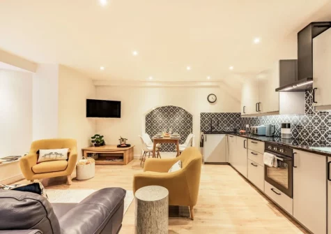 The living area & kitchen at Ocean Waves, Tenby