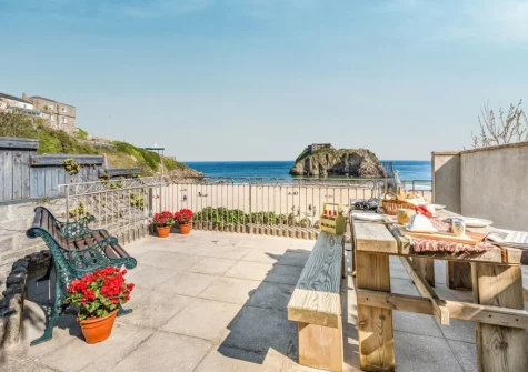The patio & alfresco dining area at Ocean Waves, Tenby
