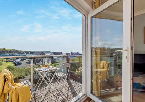 The balcony & outdoor sitting area at Ol Tywydd, Broad Haven