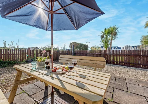 The patio & alfresco dining area at Ol Tywydd, Broad Haven