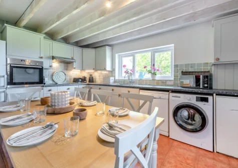 The kitchen & dining area at Orlandon Farm Cottage, St Brides