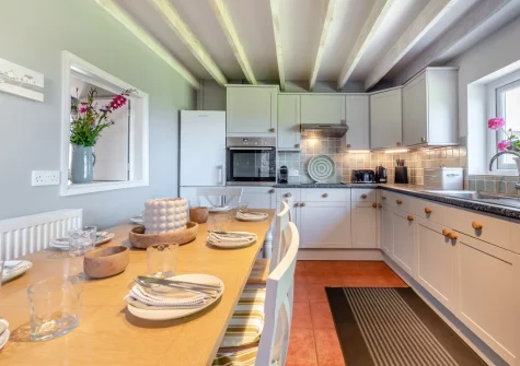 The kitchen & dining area at Orlandon Farm Cottage, St Brides
