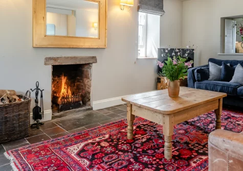 Orlandon Farm Cottage, St Brides is a beautifully presented stone retreat surrounded by peaceful Pembrokeshire farmland, featuring a cosy log fire, enclosed garden with play area, and footpath access to coastal walks and sandy coves.