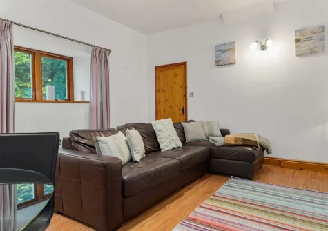 The open-plan living area at Owls Retreat, West Elliamston