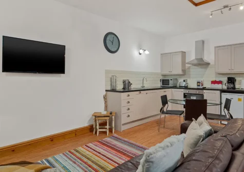 The open-plan living area at Owls Retreat, West Elliamston