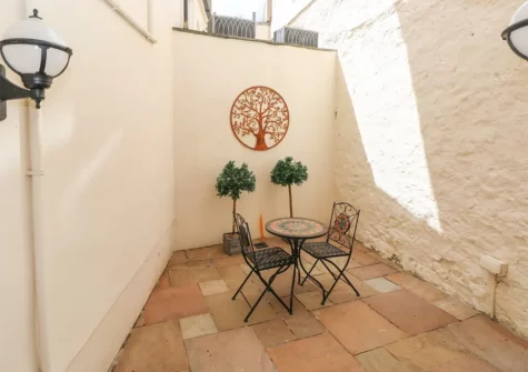 One of two patios at Paradwys, Tenby