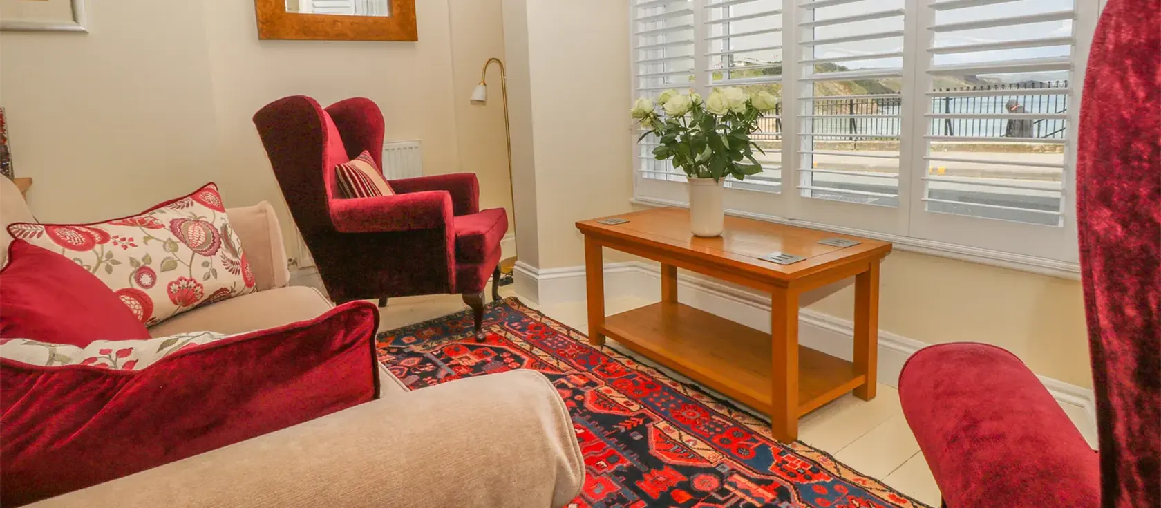 Paradwys, Tenby is an elegant ground-floor apartment located just steps from Tenby North Beach. This beautifully decorated two-bedroom, two-bathroom flat enjoys views of the beach from one of two lounge areas and features two sheltered courtyards.