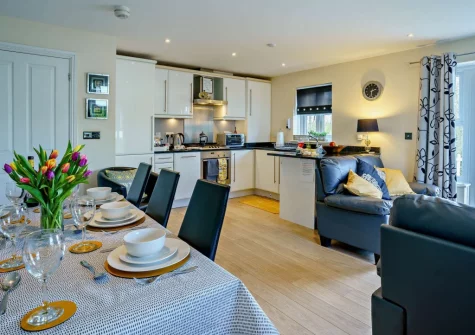The dining area at Park Place Court 3 Plas Bach, Tenby