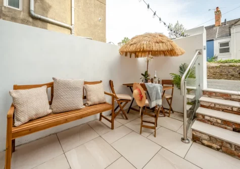 The courtyard garden & outdoor sitting area at Pembroke House, Tenby