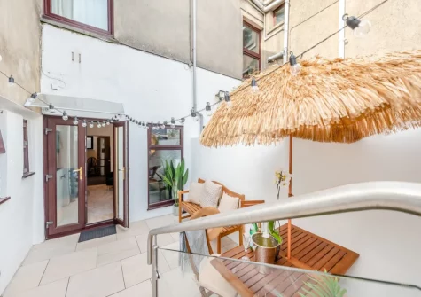The courtyard garden & outdoor sitting area at Pembroke House, Tenby