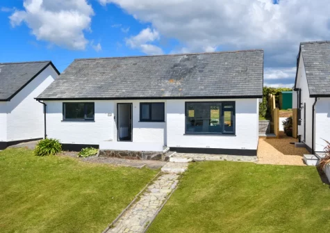 Penduick is a family-friendly detached holiday home, with elegant coastal interiors, in an enviable, elevated position on Abersoch's popular Cae Du estate