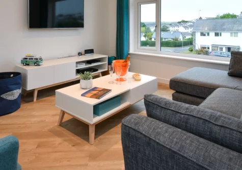 Penduick, Abersoch is a beautifully refurbished detached house on the sought-after Cae Du estate, featuring elegant coastal interiors, generous enclosed gardens with dining patio, and just a short stroll to Abersoch's golden beach and village.
