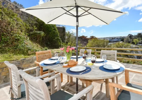 The patio & alfresco dining area at Pentraeth Cottage, Abersoch