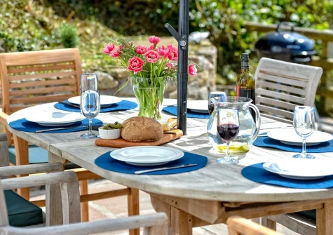 The patio & alfresco dining area at Pentraeth Cottage, Abersoch