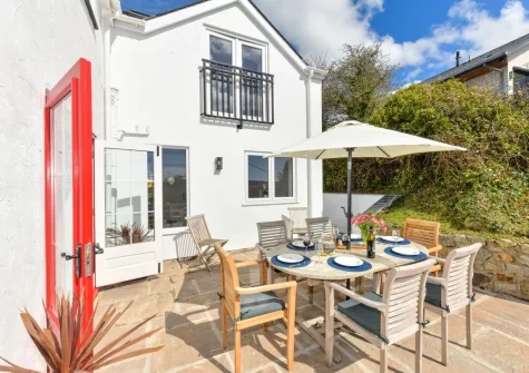 The patio & alfresco dining area at Pentraeth Cottage, Abersoch
