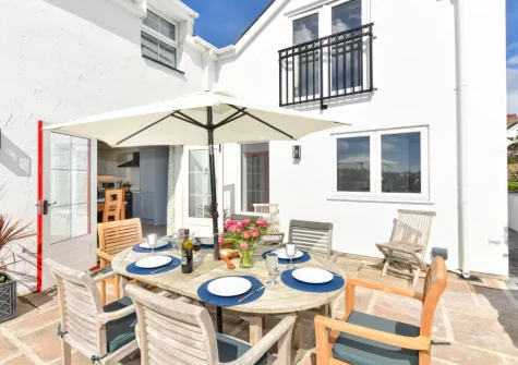 The patio & alfresco dining area at Pentraeth Cottage, Abersoch