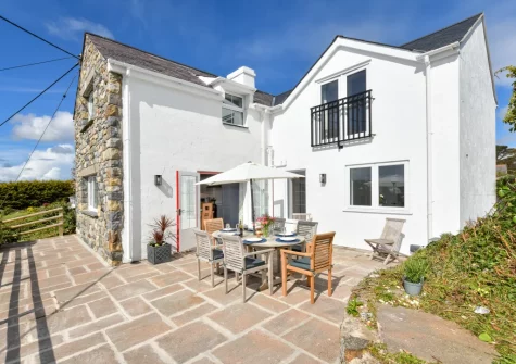 The patio & alfresco dining area at Pentraeth Cottage, Abersoch