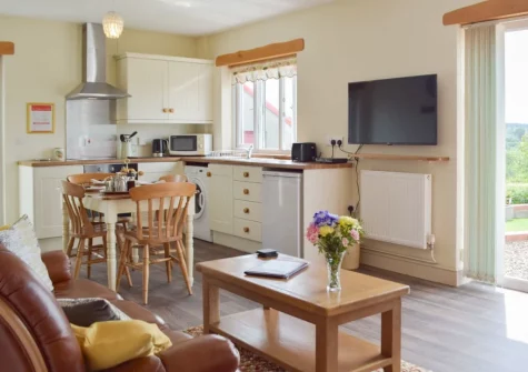 The living, dining area & kitchen at Piglets Cottage, Canaston Bridge