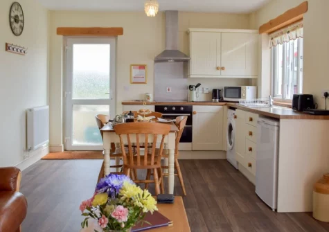 The kitchen & dining area at Piglets Cottage, Canaston Bridge