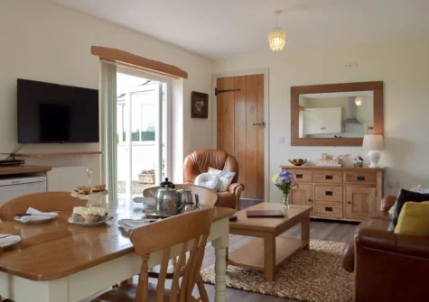 The dining & living area at Piglets Cottage, Canaston Bridge