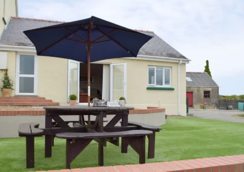 The patio & alfresco dining area at Piglets Cottage, Canaston Bridge