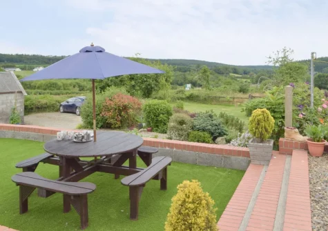 The patio & alfresco dining area at Piglets Cottage, Canaston Bridge