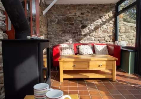 The living area at Pine Cottage at Woodlands Farm, Little Haven