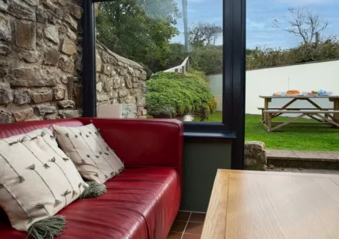 The living area at Pine Cottage at Woodlands Farm, Little Haven