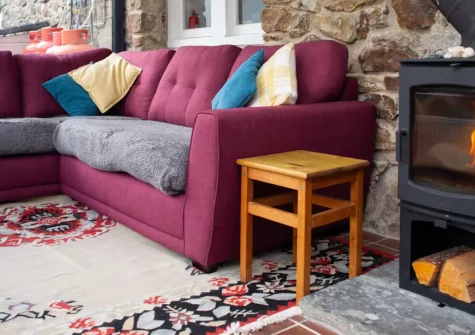 Pine Cottage at Woodlands Farm, Little Haven is a welcoming three-bedroom retreat nestled in the Pembrokeshire countryside, offering sea views, an enclosed garden, and woodland paths leading downhill to Little Haven's sandy beach and coastal pubs.