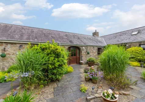 Primrose Cottage, one of six, is a charming traditional stone cottage in a peaceful setting