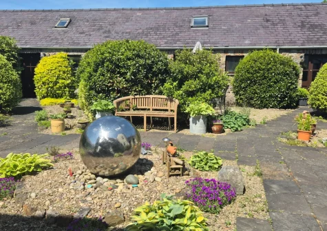 The shared patio & outdoor sitting area at Primrose Cottage, Haverfordwest