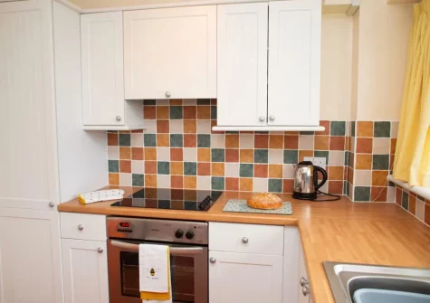 The kitchen at Puffins Nest at Croft Court, Tenby
