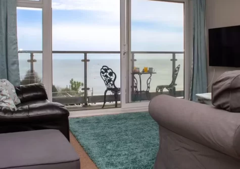 Puffins Nest at Croft Court, Tenby is a stunning fifth-floor apartment just 30 metres from the beach, offering superb sea and harbour views from a private balcony, bright contemporary interiors, and lift access throughout for added convenience.