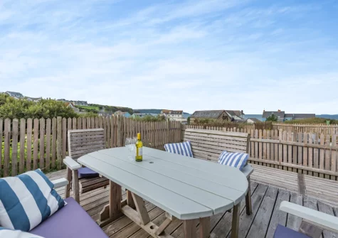The decked patio & alfresco dining area at Pufflings, Broad Haven