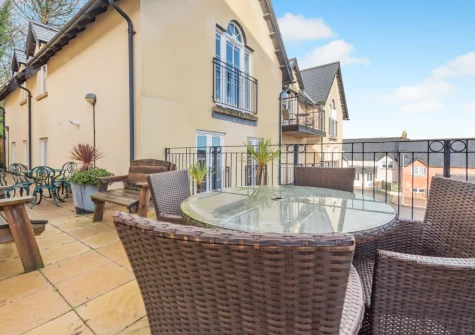 The shared patio & alfresco dining area at Rhodewood Apartment, Saundersfoot