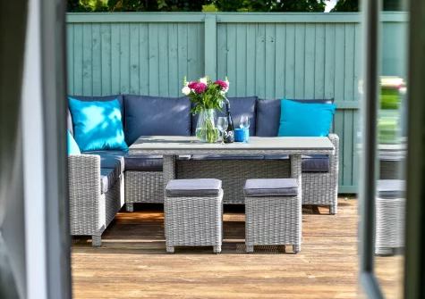 Step out on to the decked patio, barbecue & alfresco dining area
