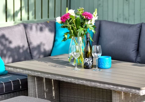 The decked patio, barbecue & alfresco dining area at Rockpools at 135 Cae Du, Abersoch