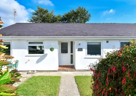 Rockpools at 135 Cae Du is a spacious open-plan seaside bungalow in Abersoch, ideal for a family holiday