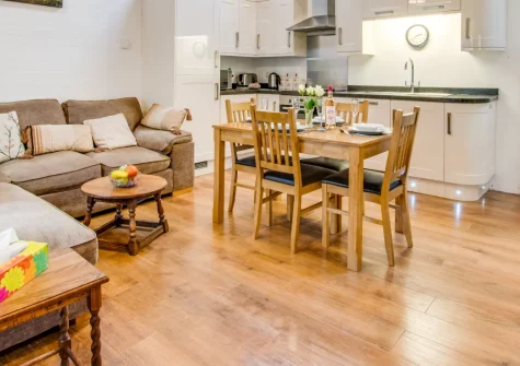 Rose Cottage, Haverfordwest is a characterful stone retreat nestled in peaceful countryside, featuring exposed beams and contemporary touches, two ground-floor double bedrooms with en-suites, and easy access to Pembrokeshire's stunning coast.