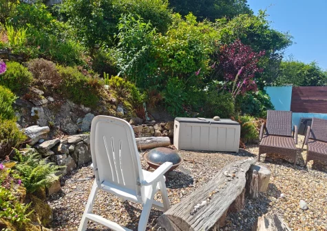 The firepit & outdoor sitting area at Sanderling House, Dale